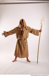 JOEL_ADAMSON STANDING POSE WITH A MAGIC STICK